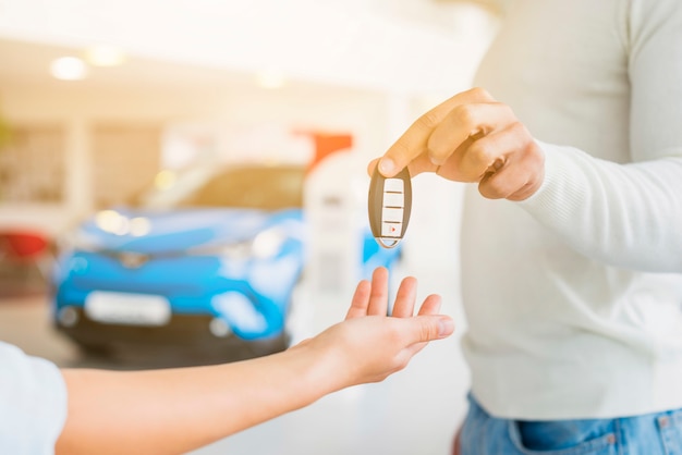 Exchanging keys in car dealership