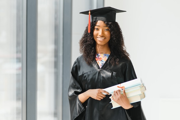 Excited African American woman at her graduation.