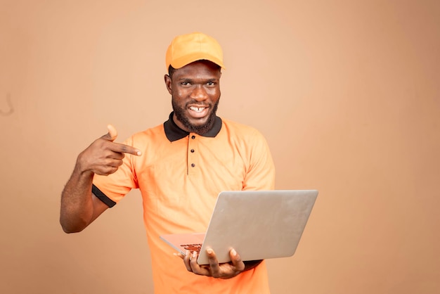 Excited african man feeling excited about what he saw on his laptop