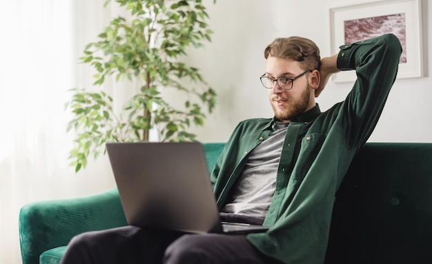 Excited bearded man in casual wear