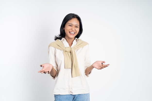 Excited beautiful woman feeling joy laughing on isolated background