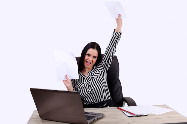 Excited business man happy smile, throw papers, papers flying in the air, business people, sitting on a desk to hold your hands up hands, concept of success after sign contract