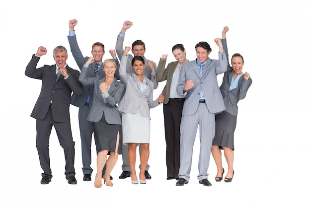 Excited business team cheering at camera