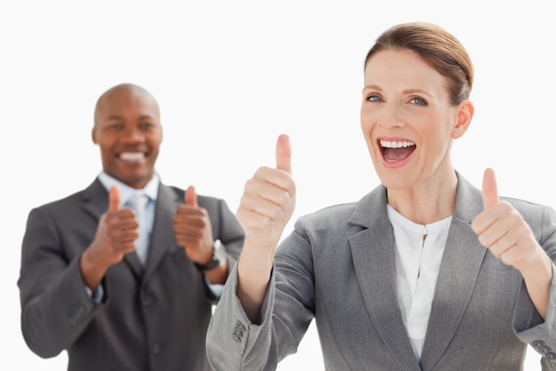 Photo excited businesspeople with thumbs up