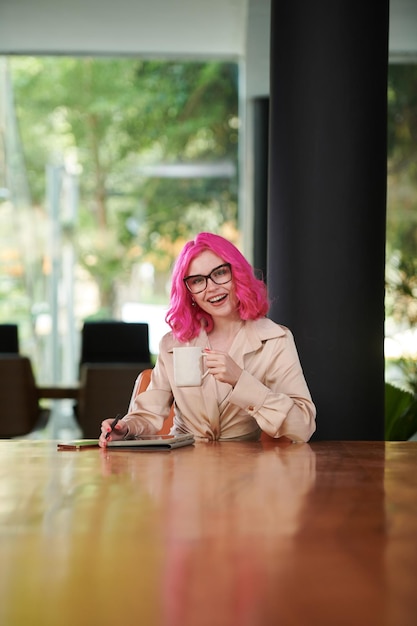 Excited Businesswoman Working on Laptop