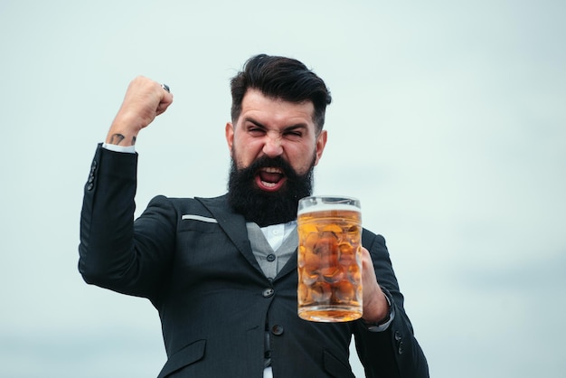 Excited drunk man wwith glass of beer expression emotions