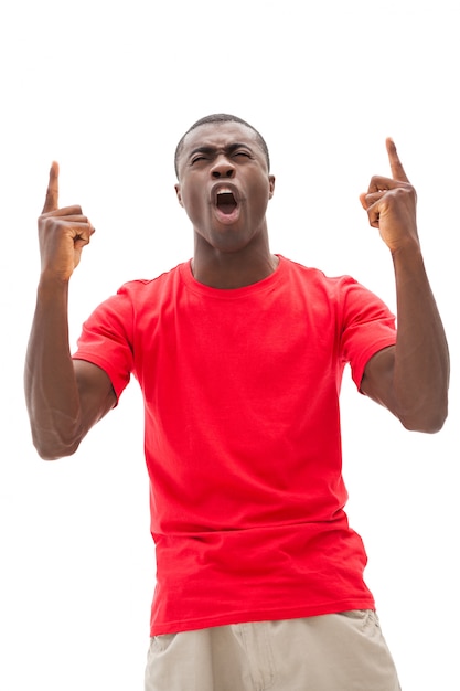 Excited football fan in red cheering