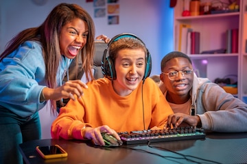 Premium Photo  Excited gamers friends playing video games at home