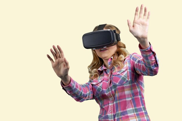 Excited girl using virtual reality headset isolated on white background people modern technolgy and