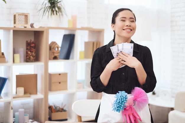 Excited Housekeeper Got Tips Holds Lot of Money.