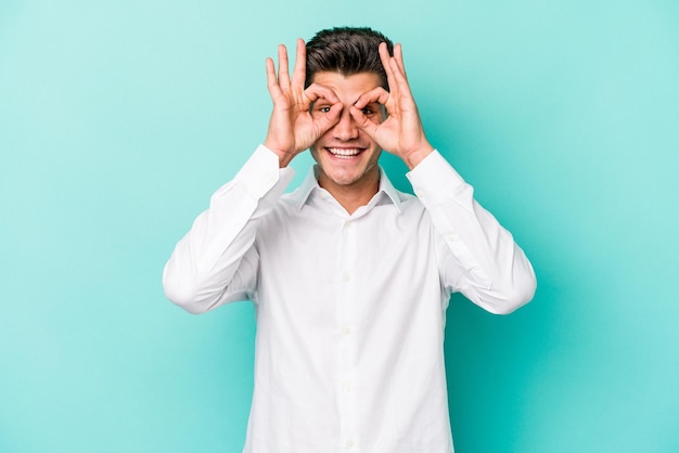 Excited keeping ok gesture on eye