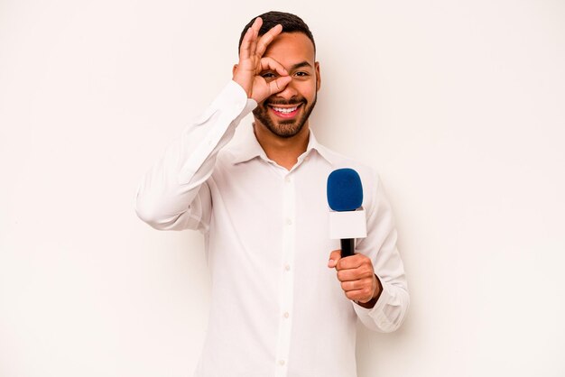 Excited keeping ok gesture on eye