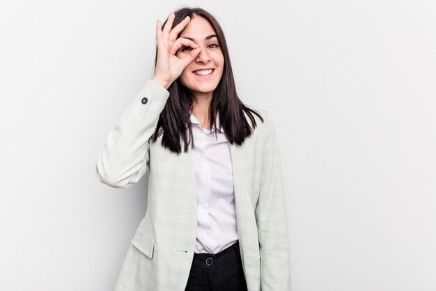 Excited keeping ok gesture on eye