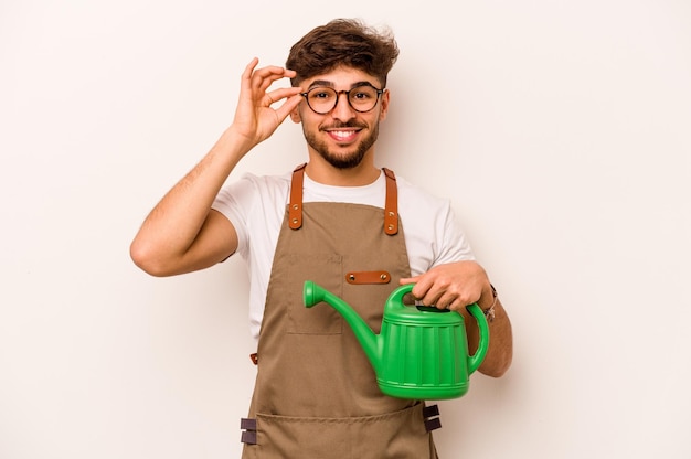 Excited keeping ok gesture on eye