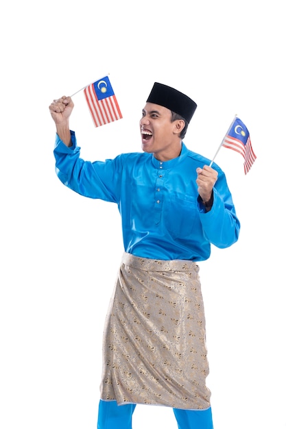 Excited malaysian man with flag