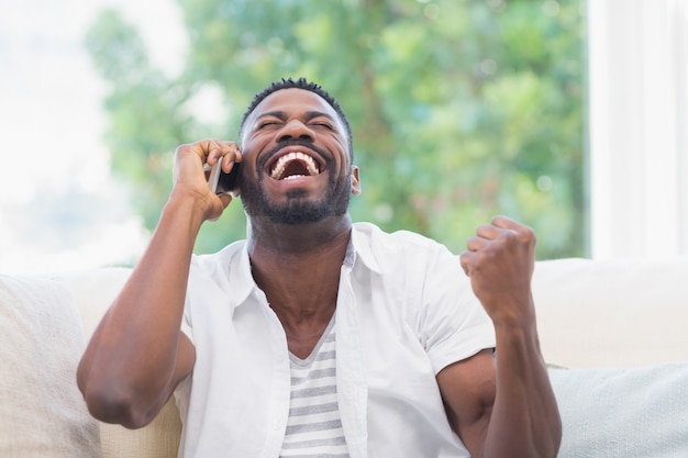 Excited man on the phone 