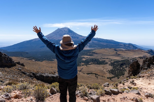 Excited Mountaineer On Top In A Beautiful Landscape