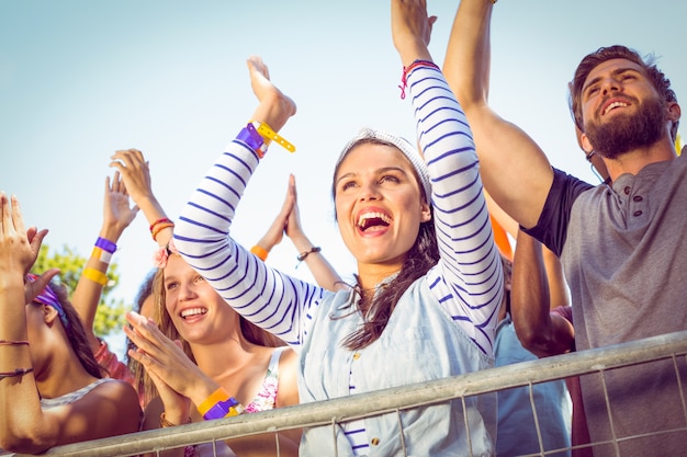 Excited music fans up the front