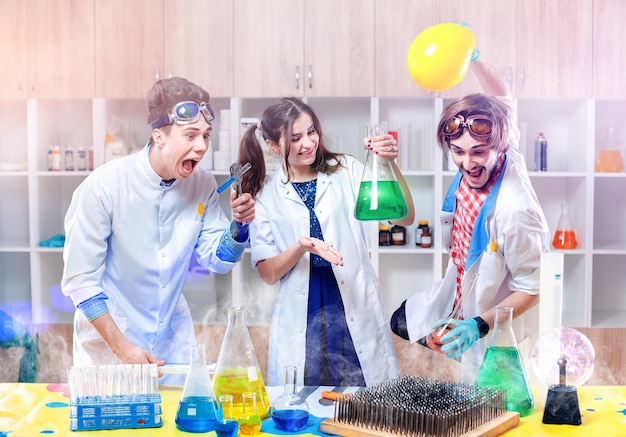 Excited scientists in lab