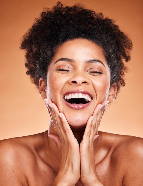 Excited skincare and beauty black woman in studio for makeup cosmetics and facial wellness glow shine and healthy skin promotion Happy young model with skin care dermatology or self love face