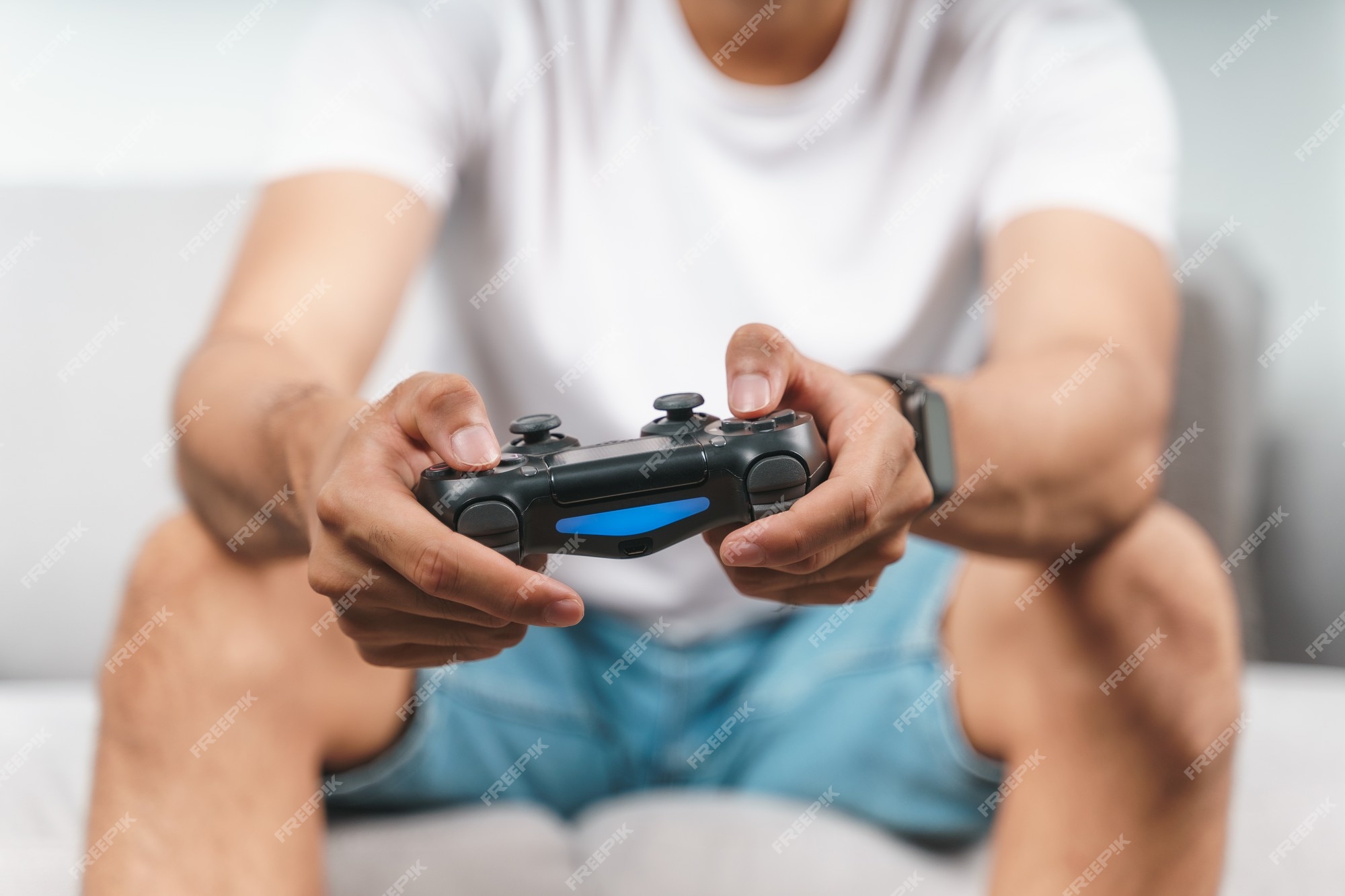 Cheerful boyfriend and girlfriend playing video games to win. Happy couple  using controller to play online game and winning gameplay on console.  People holding joystick to have fun Stock Photo - Alamy