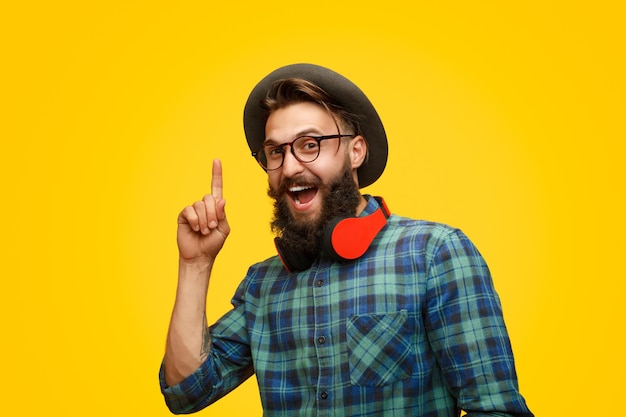 Excited young hipster having idea