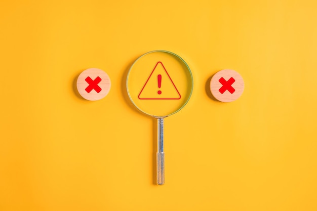 exclamation mark and red cross incorrect sign for internet network security triangle caution warning sign for notification error and maintenance internet malware viruses destroying computer data