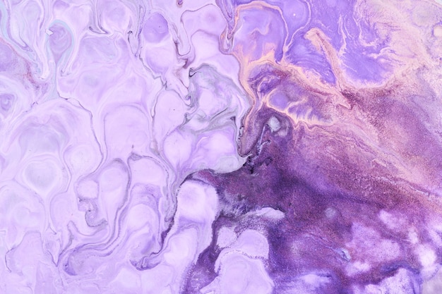 Exclusive beautiful pattern abstract fluid art background Flow of blending purple lilac paints mixing together Blots and streaks of ink texture for print and design