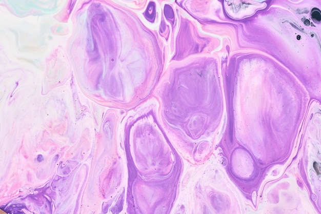 Exclusive beautiful pattern abstract fluid art background Flow of blending purple lilac paints mixing together Blots and streaks of ink texture for print and design