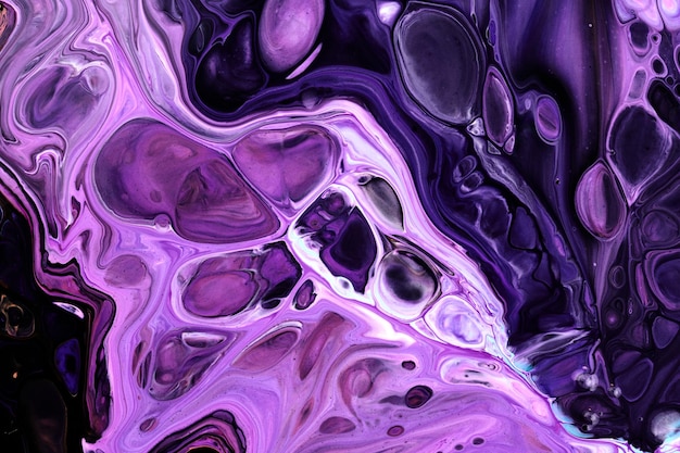 Exclusive beautiful pattern abstract fluid art background Flow of blending purple lilac paints mixing together Blots and streaks of ink texture for print and design