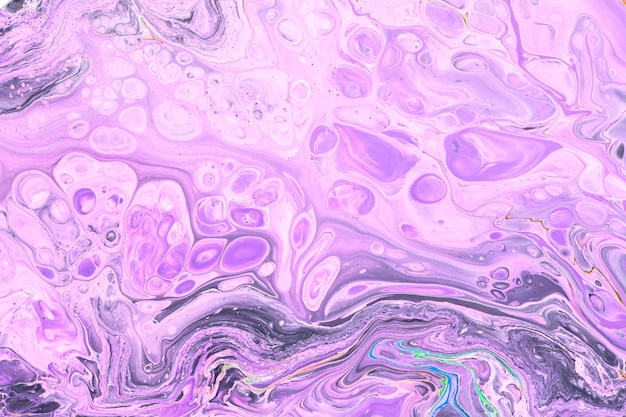 Exclusive beautiful pattern abstract fluid art background Flow of blending purple lilac paints mixing together Blots and streaks of ink texture for print and design