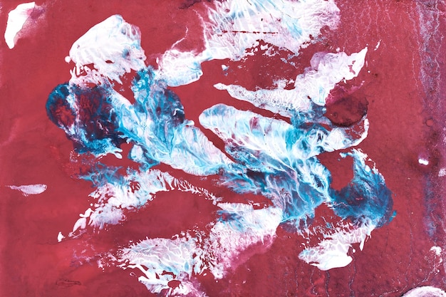 Exclusive beautiful pattern abstract fluid art background Flow of blending red blue white paints mixing together Blots and streaks of ink texture for print and design