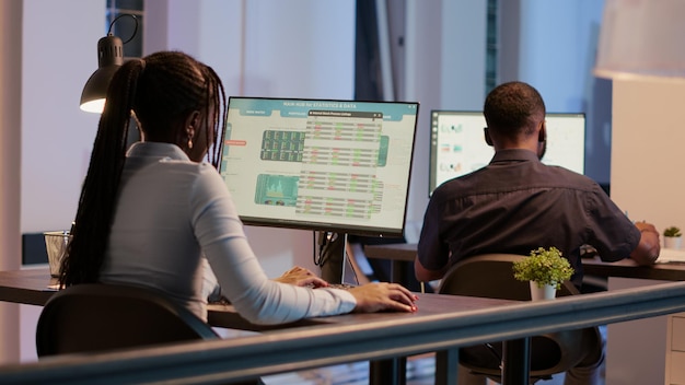 executive assistant working with business internet application, using web 3.0 navigation page on computer. analyzing online website information with network, browse internet app.