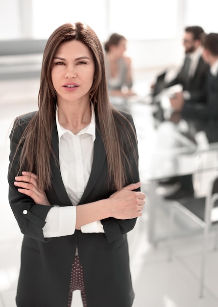 Executive business woman on the background of the workplace