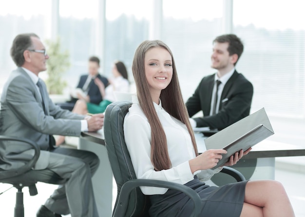 Executive business woman with clipboard modern office