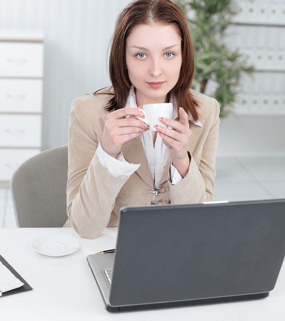 Executive business woman with a Cup of coffee.