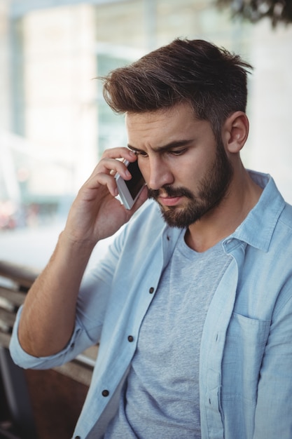 Executive talking on mobile phone