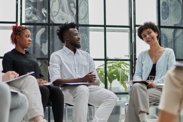 Photo executive team listening to contrary views from colleague