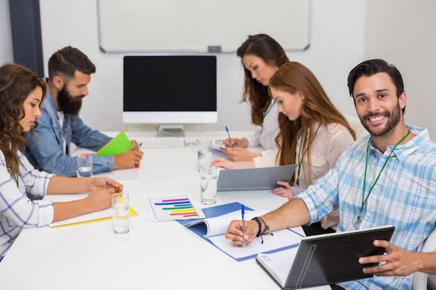 Executives working in conference room