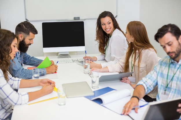 Executives working in conference room