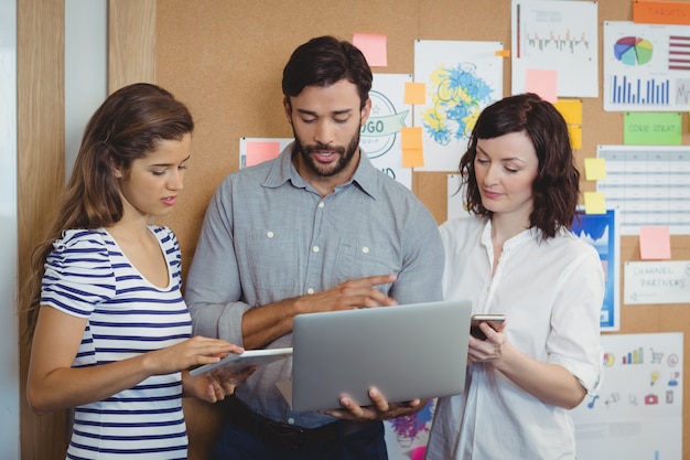 Executives working together in office