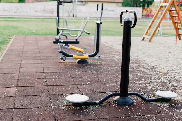 Exercise tools in the public park. Family and relax time on holiday concept.