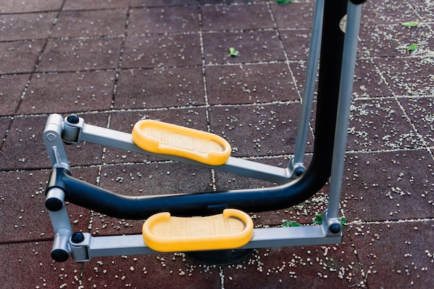 Exercise tools in the public park Family and relax time on holiday concept