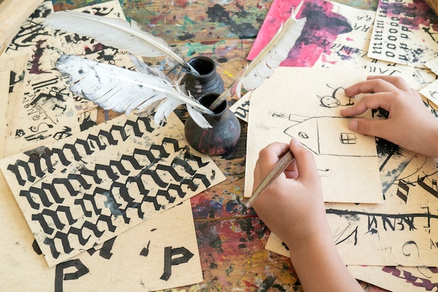 Exercises on spelling and calligraphy on yellow paper