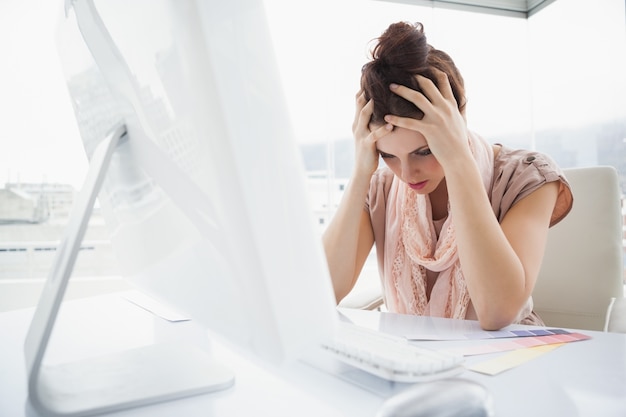 exhausted businesswoman working with colour sample