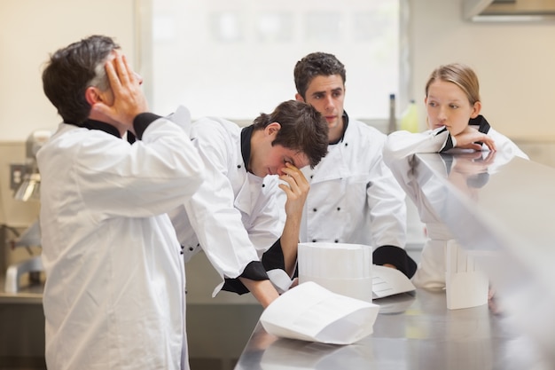 Exhausted team of chefs