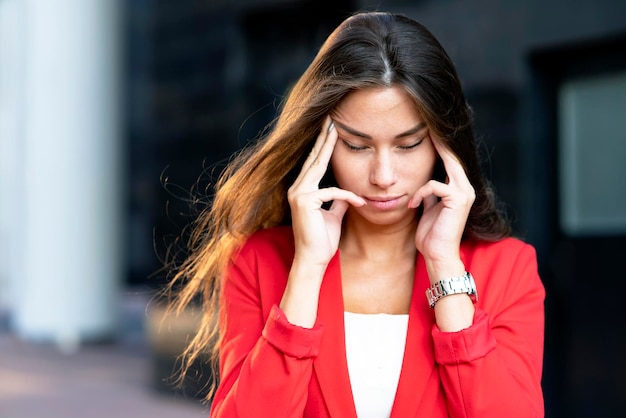 Exhausted tired disappointed businesswoman beautiful young girl lady with a sad negative look a woma...