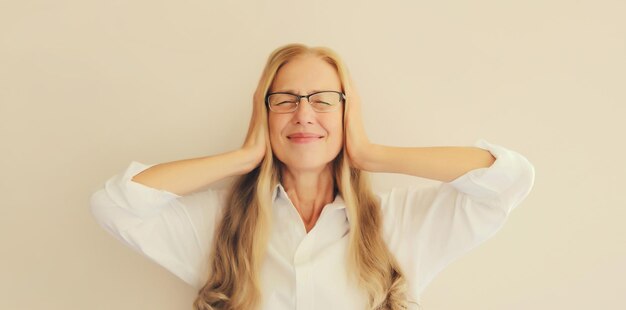 Photo exhausted tired woman employee with headache suffering from migraine