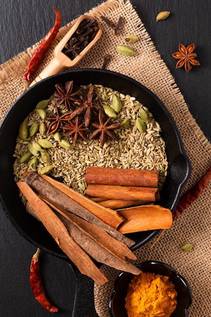 Exotic herbal Food concept Mix of the organic Spices in slilet cast