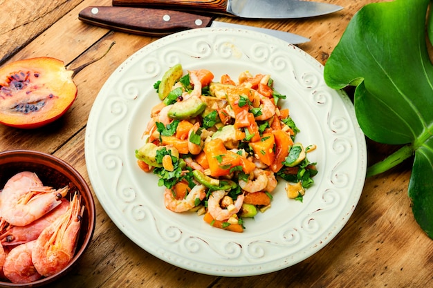 Exotic salad with tamarillo and prawn